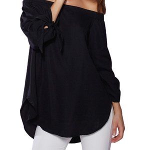 Black off the shoulder blouse with puff sleeves